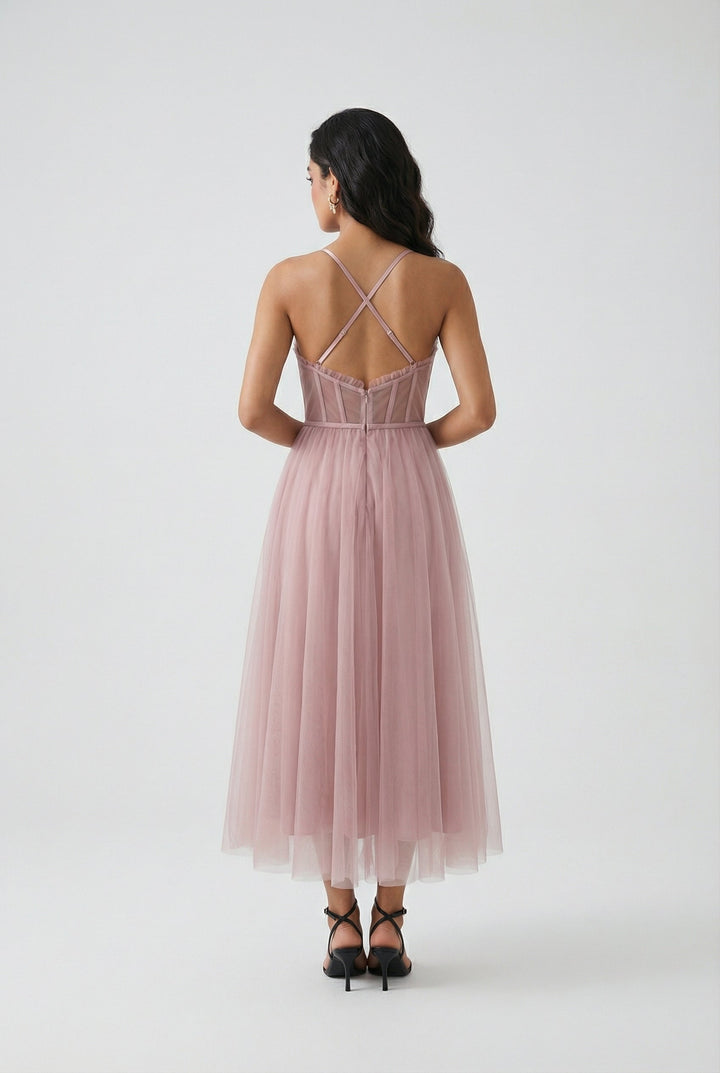 Chic sleeveless pink dress, a versatile midi length for stylish women's fashion.