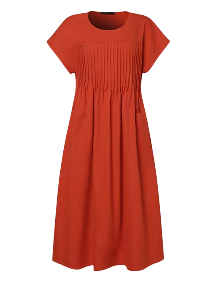 Women's elegant pleated bodice midi dress with short sleeves, relaxed fit, and side pockets for versatile everyday style.