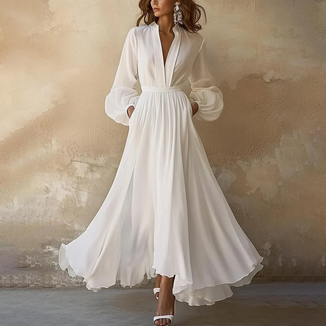 Women's elegant pleated maxi dress featuring a V-neck and stylish balloon sleeves, ideal for spring & summer.