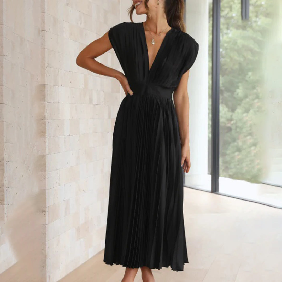 Women's stylish short sleeve V-neck pleated maxi dress, designed for refined occasions.