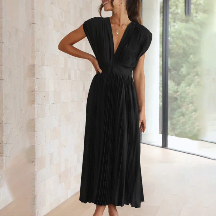 Women's stylish short sleeve V-neck pleated maxi dress, designed for refined occasions.