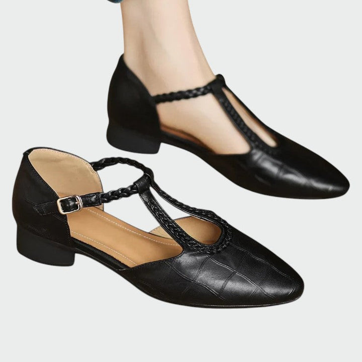 Women's elegant pointed T-bar Mary Jane shoes with buckle strap, perfect for classic style.