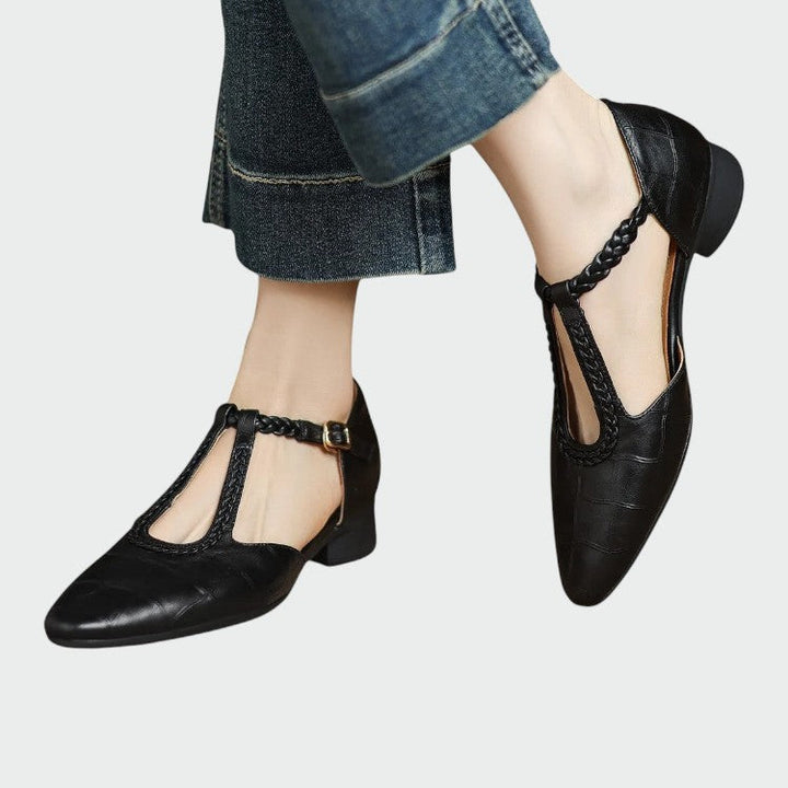 Elegant women's pointed toe T-bar Mary Jane shoes featuring a comfortable block heel and classic design.