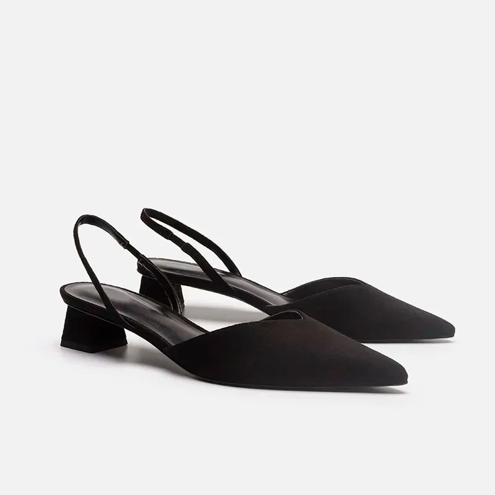 Women's elegant pointed toe kitten heel slingbacks. Classic low heel dress shoes for sophisticated style.
