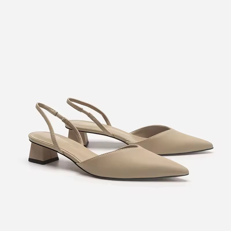 Elegant women's pointed toe slingbacks featuring a comfortable kitten heel. Perfect dress shoes for work and parties.