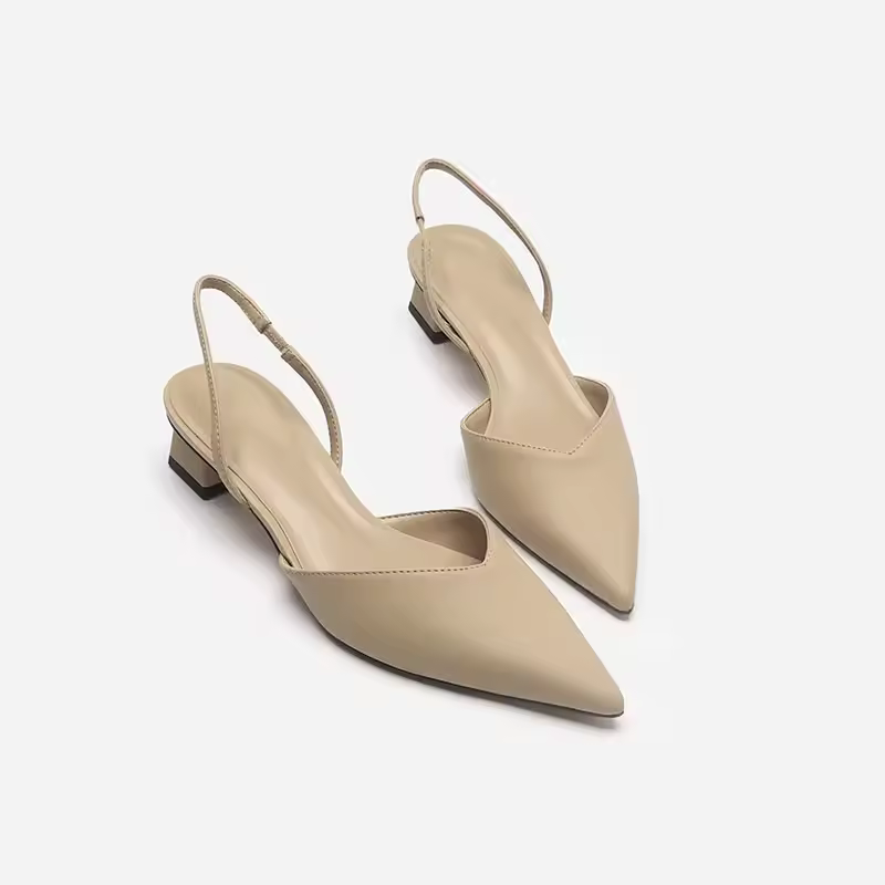 Sleek pointed toe slingbacks with a refined kitten heel, offering women's classic dress shoe style & comfort.