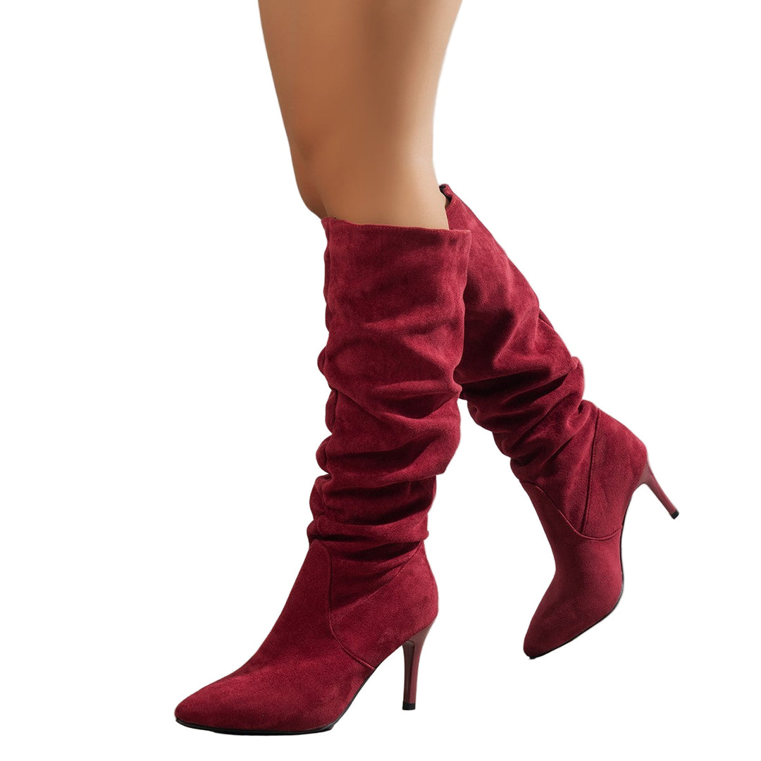 Sophisticated women's slouchy boots with a sleek pointed toe & high stiletto heel. Autumn fashion and winter style shoes.