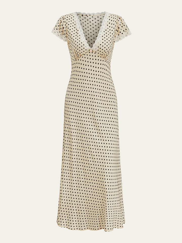 Polka dot print women's maxi dress featuring a flattering V-neck and lace.