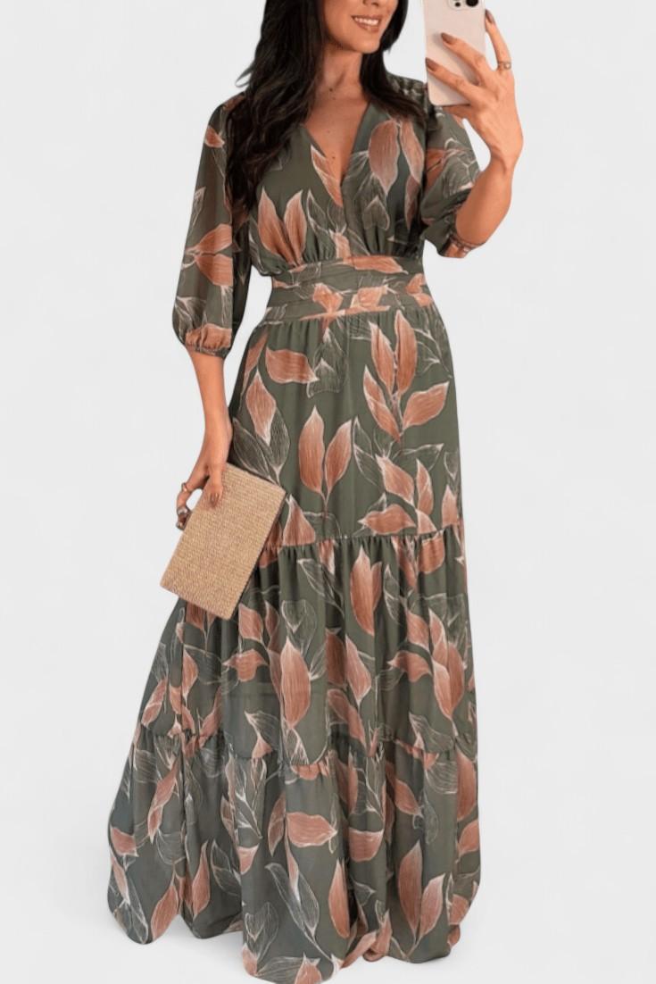 Women's elegant printed maxi dress, V-neck, flowing silhouette. Perfect for summer and spring fashion.