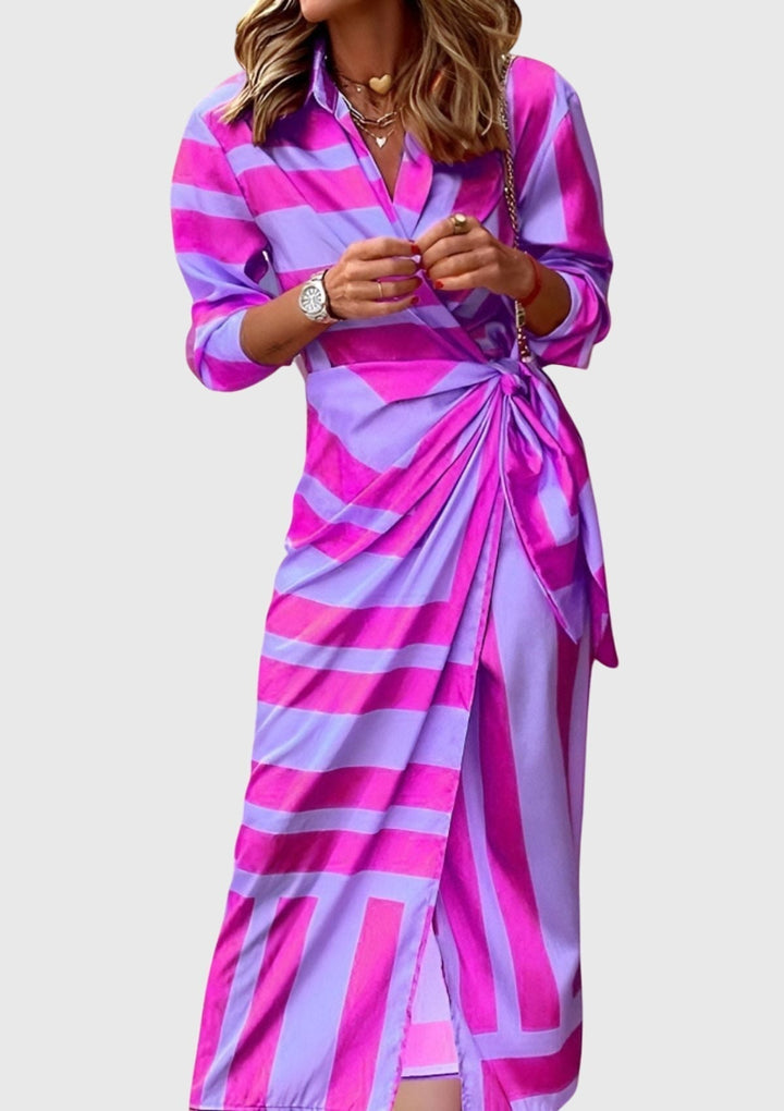 Women's flattering long printed wrap dress, chic elegant style for summer fashion.