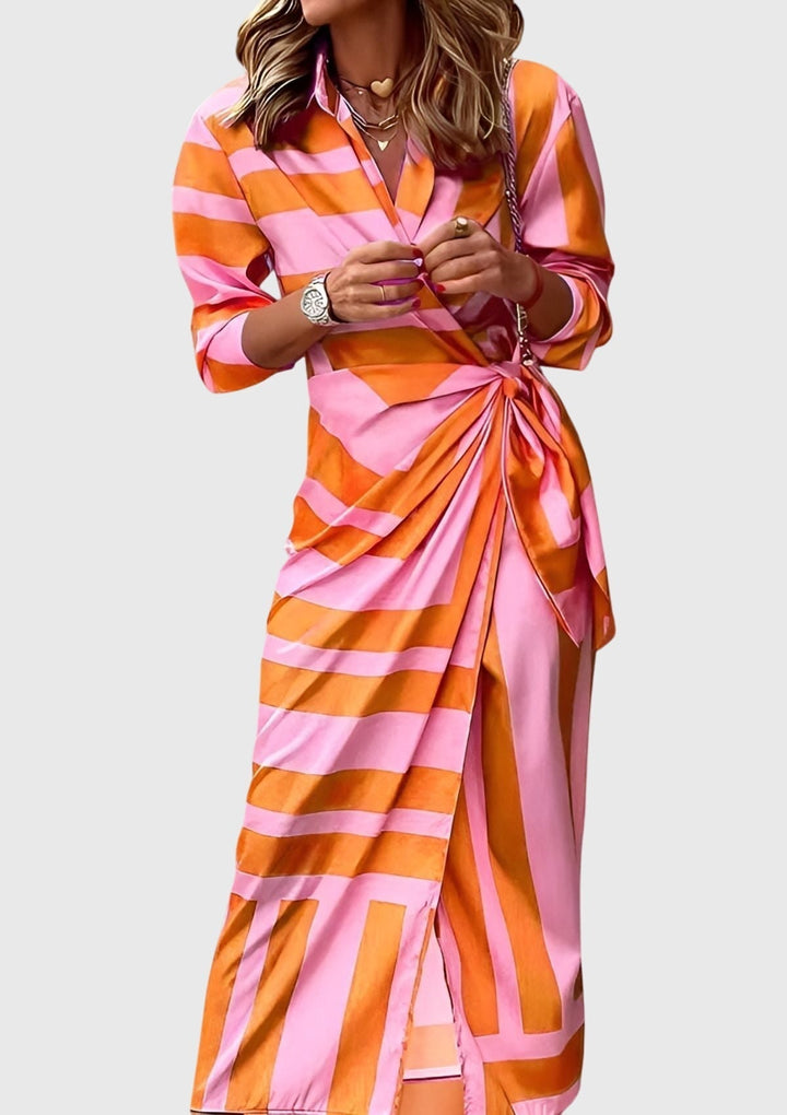 Chic women's printed wrap dress with unique pattern, versatile for spring & summer style.