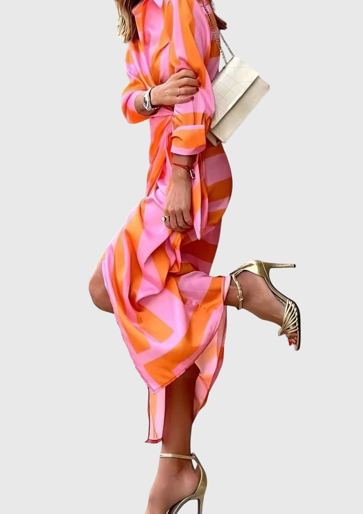 Spring/Summer women's elegant printed wrap dress, flowy & flattering for warm weather.