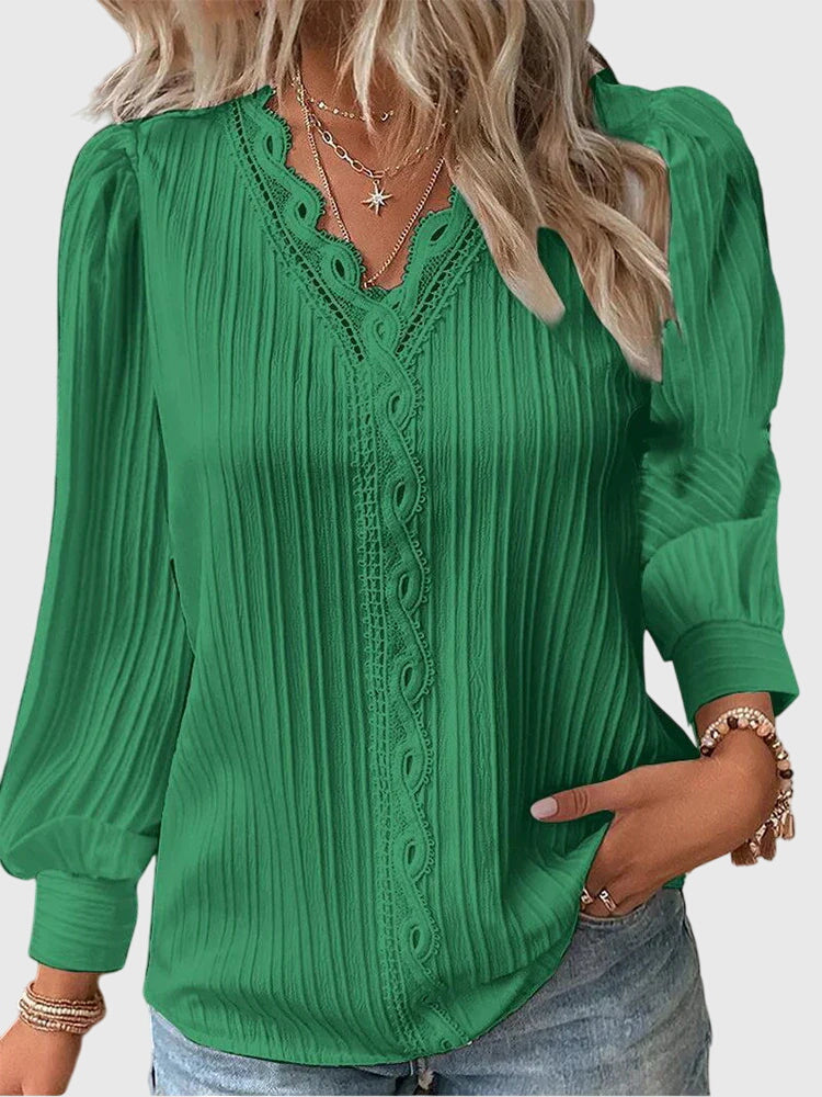 Stylish women's pullover blouse, elegant and chic. A comfortable long sleeve top for modern fashion.