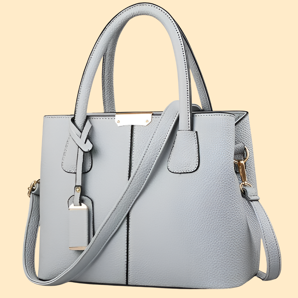 Chic structured leather shoulder bag in a rich purple hue, ideal for the modern woman.