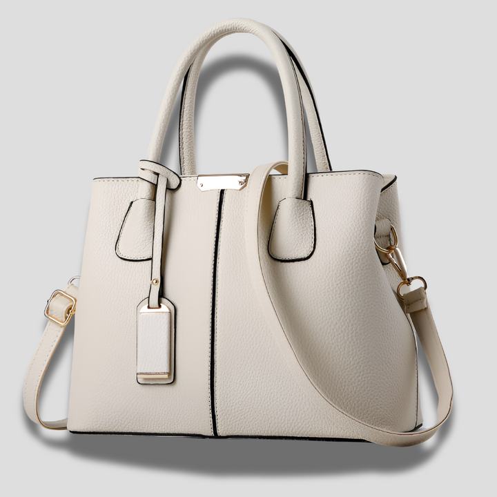 Experience elegance with this soft leather women's bag, a must-have purple fashion accessory.