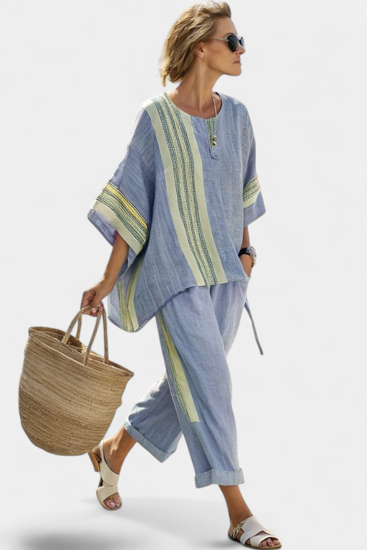 Yellow striped bohemian women's two-piece set, comfortable top & relaxed fit trousers for casual elegance.