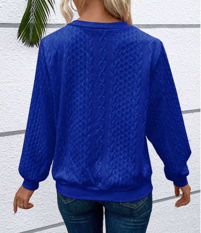 Soft women's quarter zip sweater, ideal for versatile fashion in colder months.