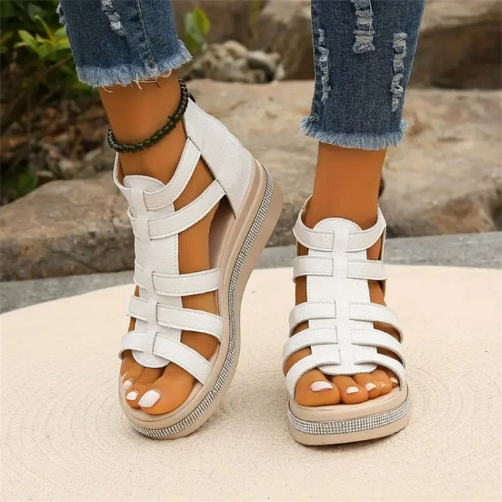 Women's dazzling wedge sandals with elegant rhinestones, perfect for stylish summer footwear.