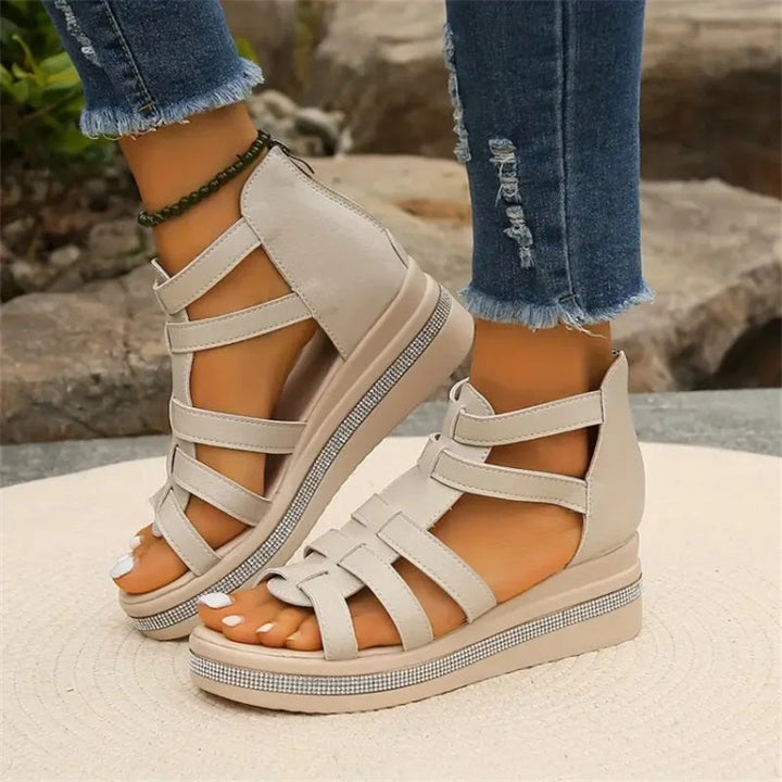 Slip-on women's wedge sandals, comfortable and stylish with sparkling rhinestone details.