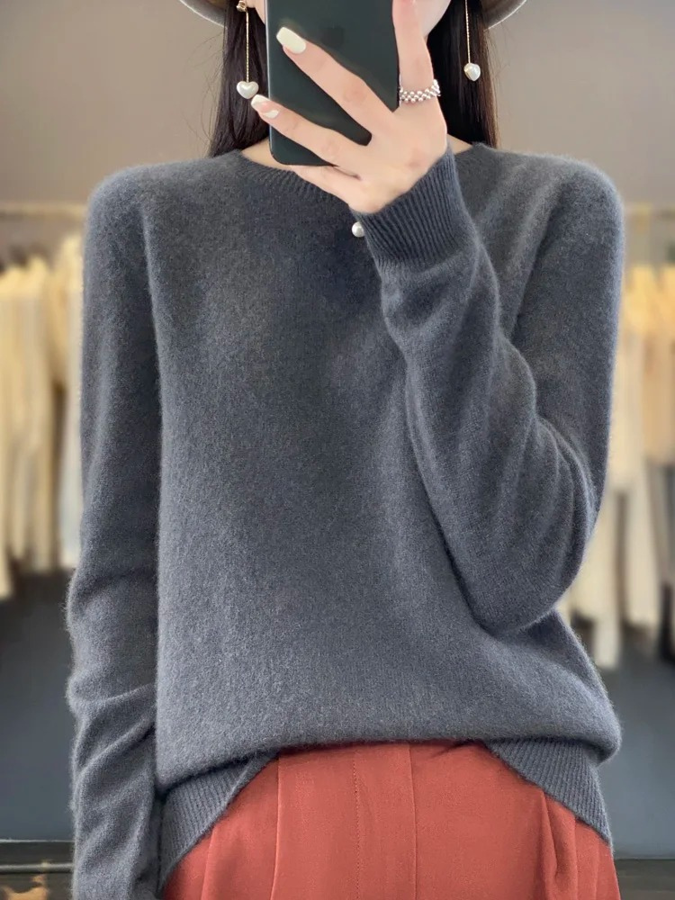 Side profile of a women's elegant round neck knit sweater, a versatile fashion staple.