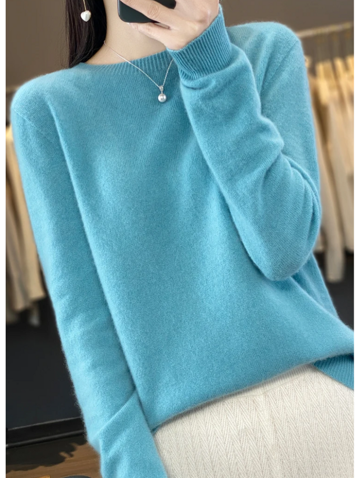 Versatile women's round neck knit top, ideal for all-season comfort and everyday elegance.