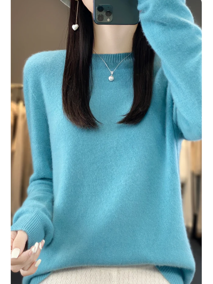 Comfort-fit women's knit sweater with a classic round neck, great for daily casual wear.
