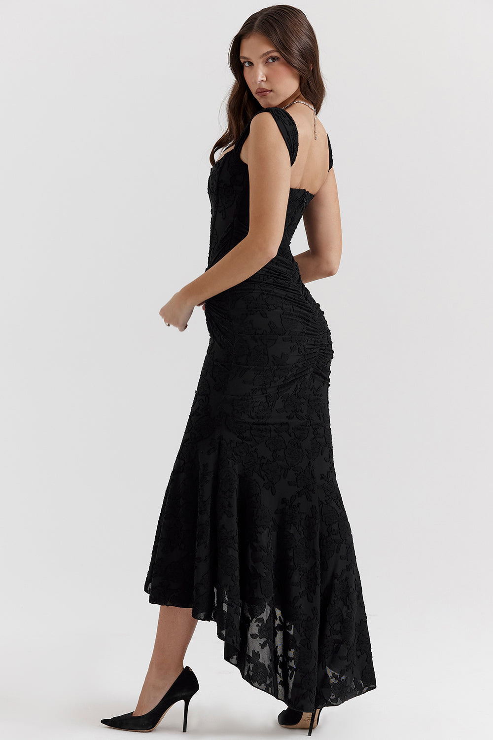 Chic ruched bodice maxi dress with flowing skirt, perfect for a wedding guest or evening party.