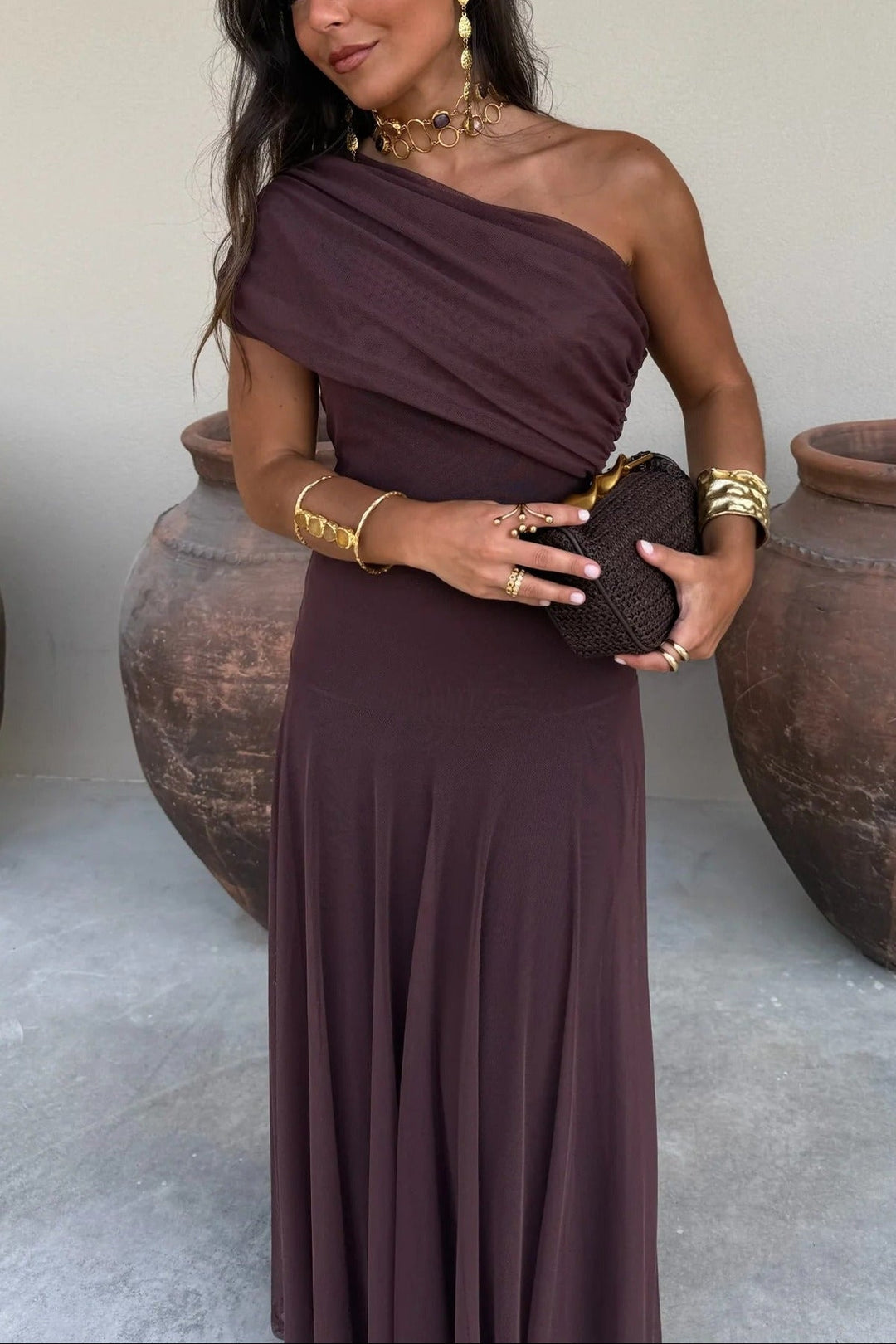 Flowy one-shoulder maxi dress for women, featuring delicate ruching, ideal for elegant summer occasions.