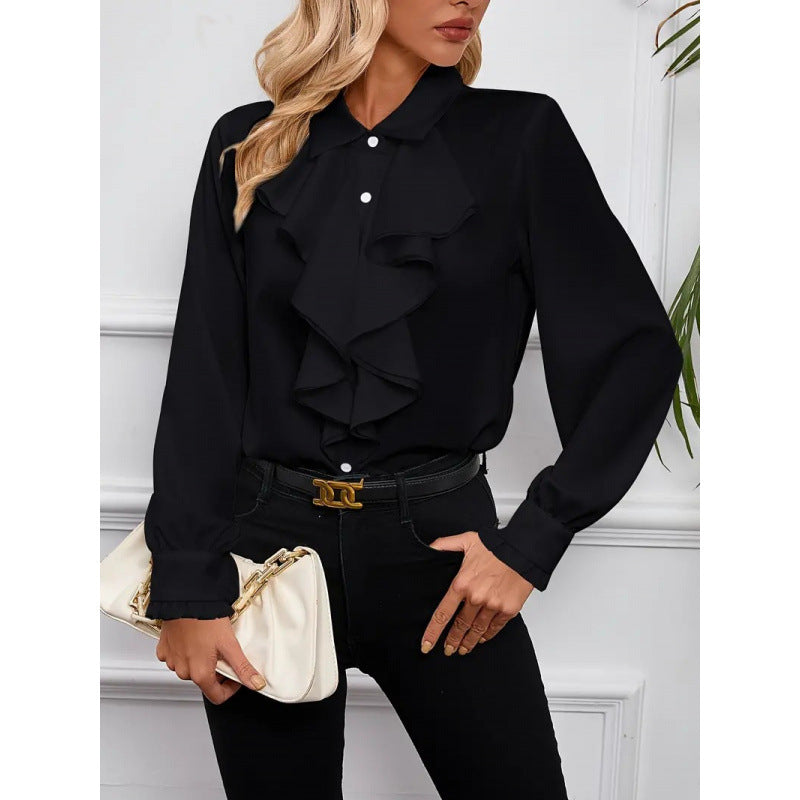 Close-up of delicate ruffle detail on the sleeves of this versatile women's blouse.