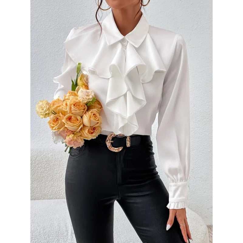 Model wearing a chic women's ruffle sleeve blouse, showcasing feminine style.