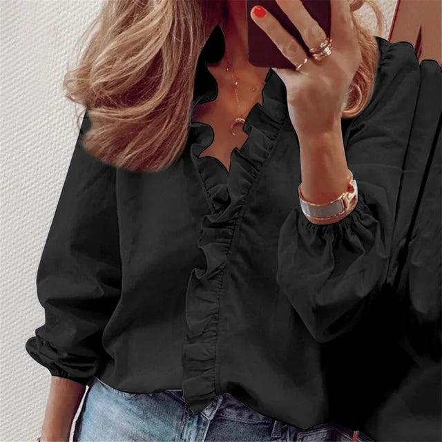 Casual women's v-neck ruffle blouse featuring stylish long balloon sleeves, comfortable for everyday wear.
