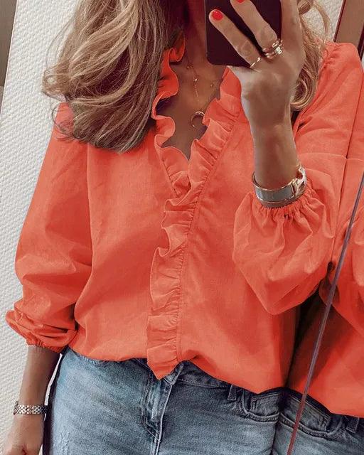 Stylish women's long-sleeve ruffle v-neck blouse, a chic and versatile top for various fashion occasions.