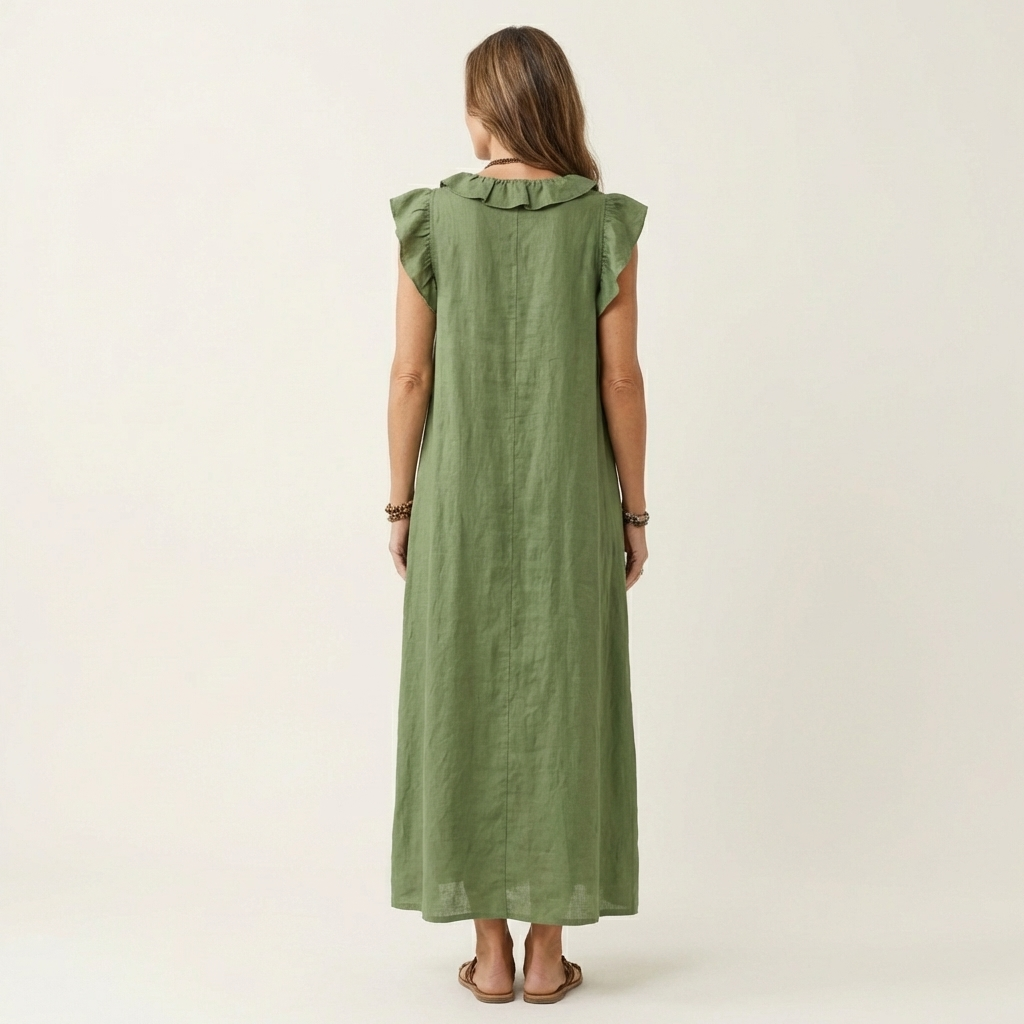 Woman wearing elegant ruffle V-neck maxi dress outdoors, perfect for a stylish summer day or holiday look.
