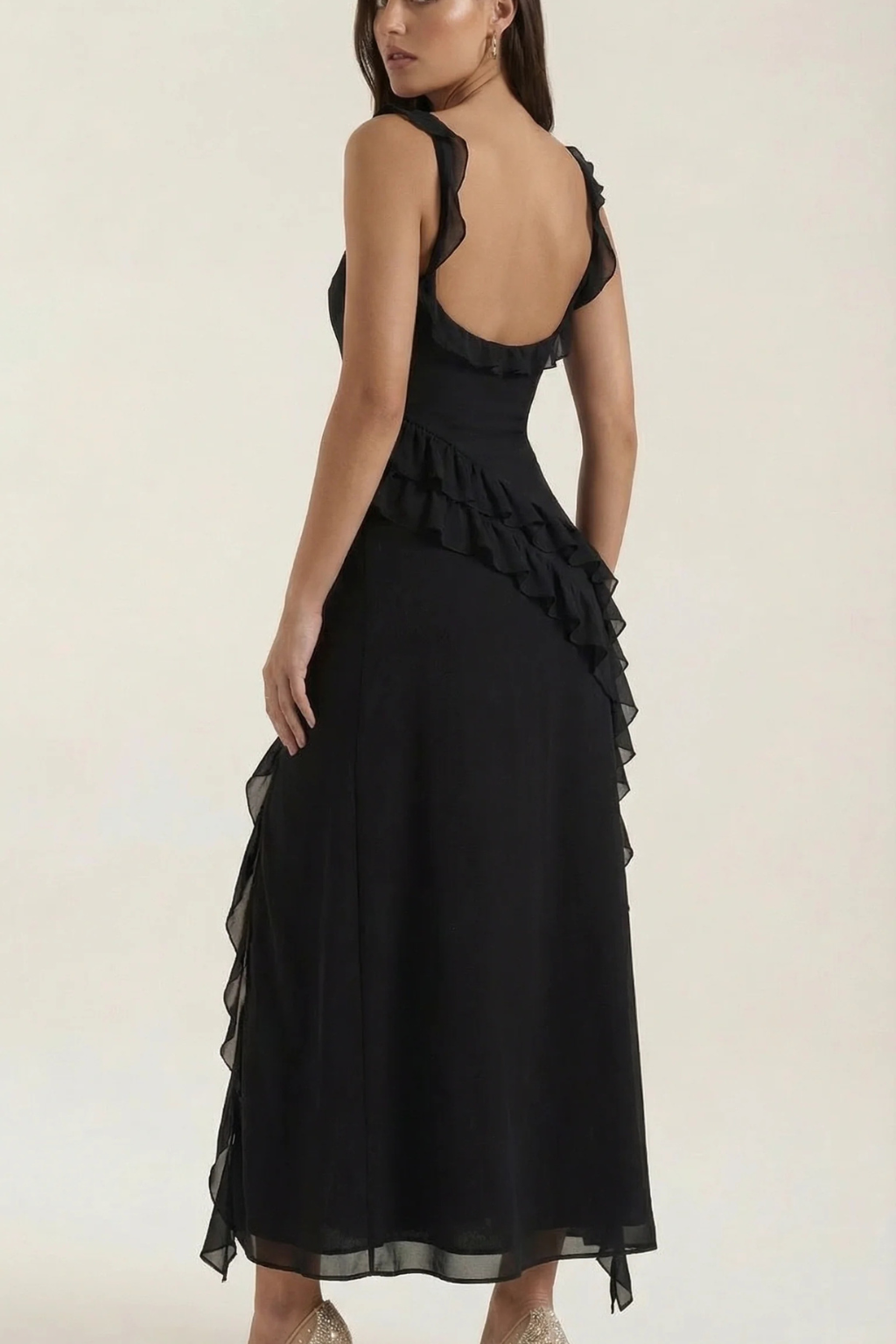Sophisticated women's graduation and party dress, sleeveless, with ruffle and a sleek side slit.