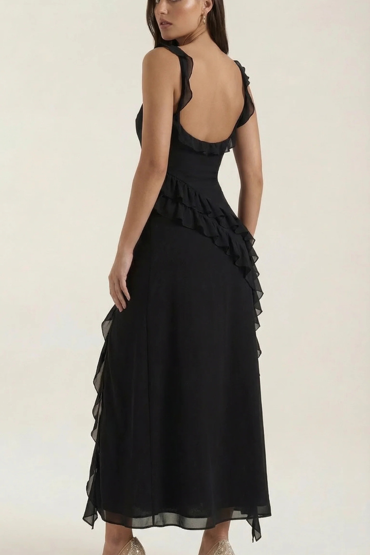 Sophisticated women's graduation and party dress, sleeveless, with ruffle and a sleek side slit.