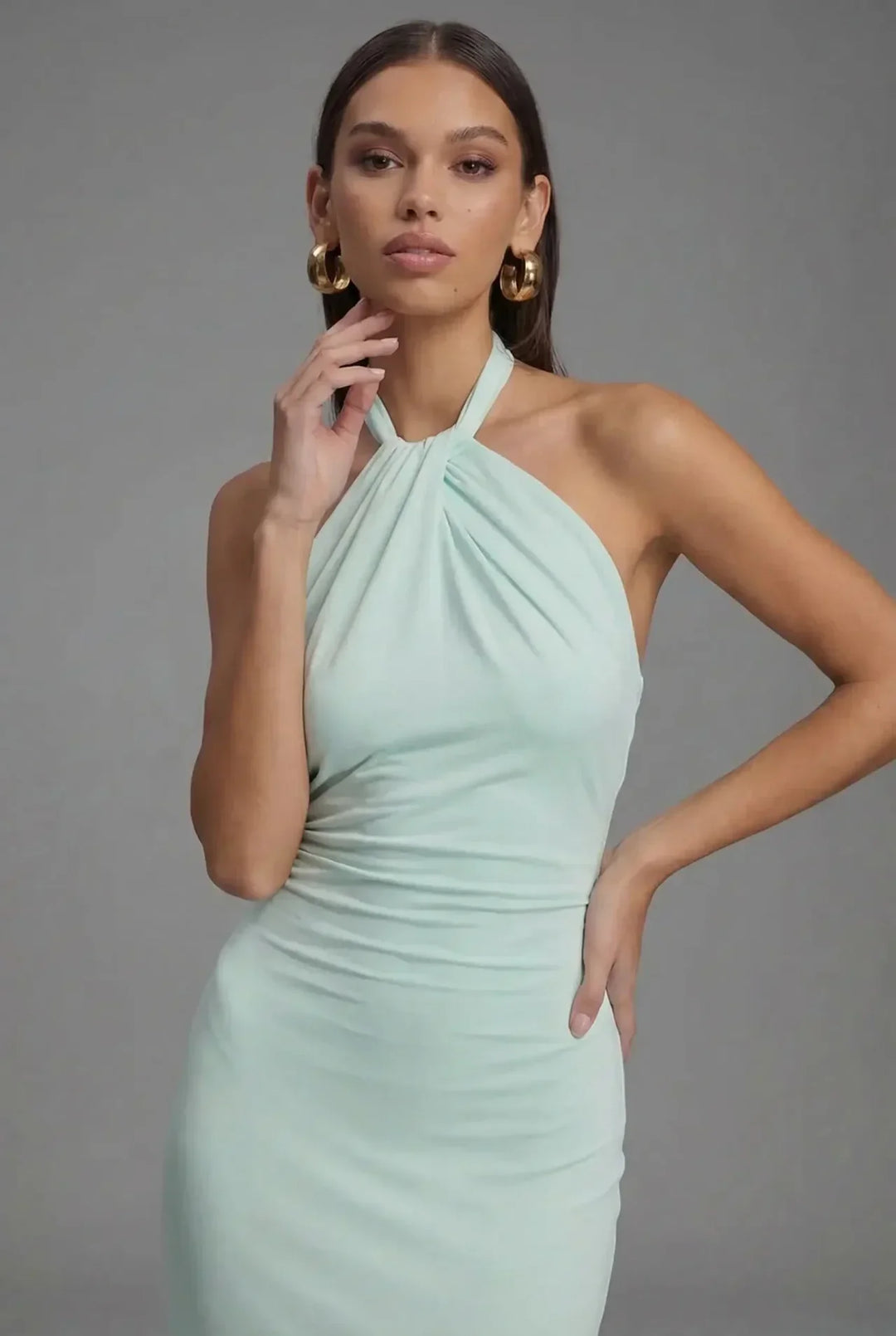Elegant women's satin evening gown, featuring a flattering halter neckline