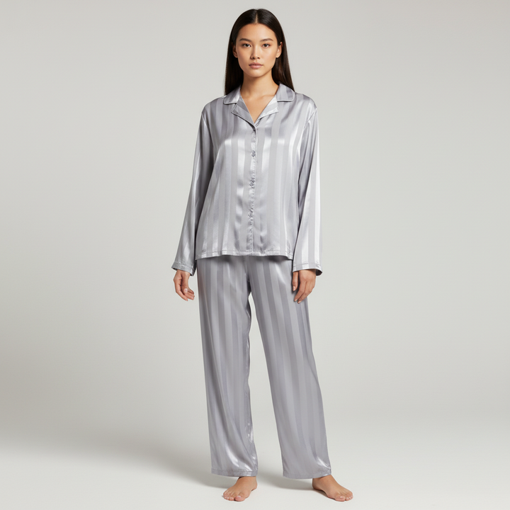 Full view of the women's satin sleepwear set, featuring a button-up shirt and pants.