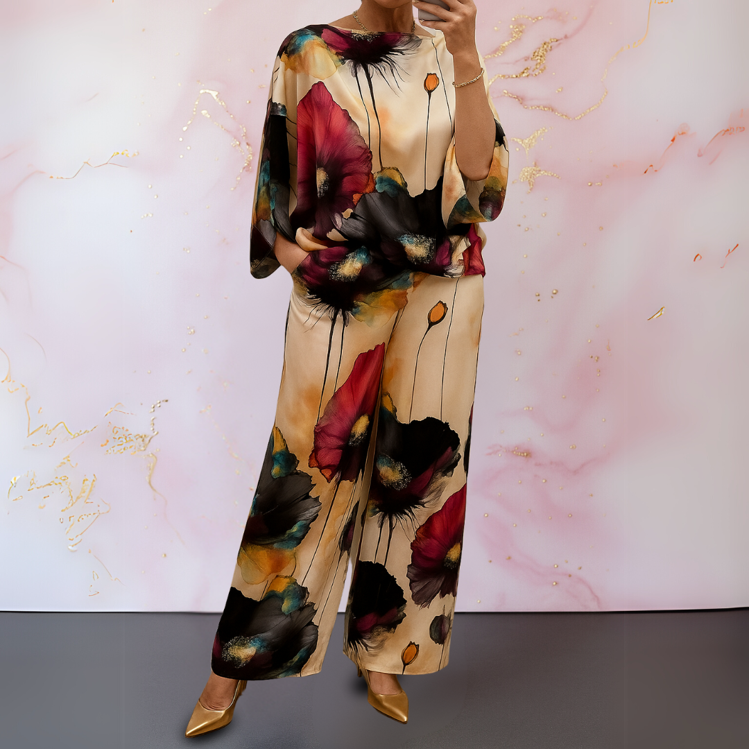 Luxurious women's satin matching set. Elegant two-piece top & wide-leg pants for a sophisticated look.
