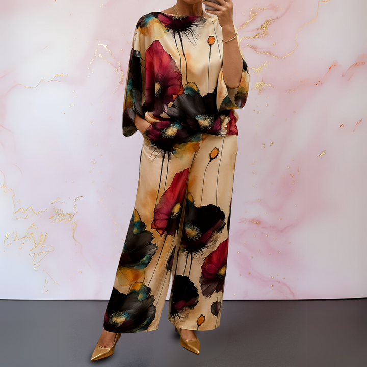 Luxurious women's satin matching set. Elegant two-piece top & wide-leg pants for a sophisticated look.