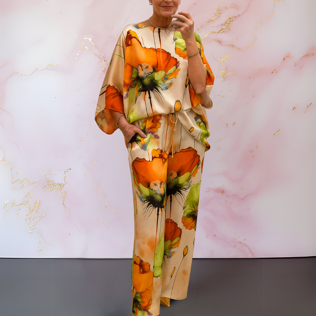 Stylish women's satin two-piece set featuring a sophisticated top and comfortable wide-leg pants.