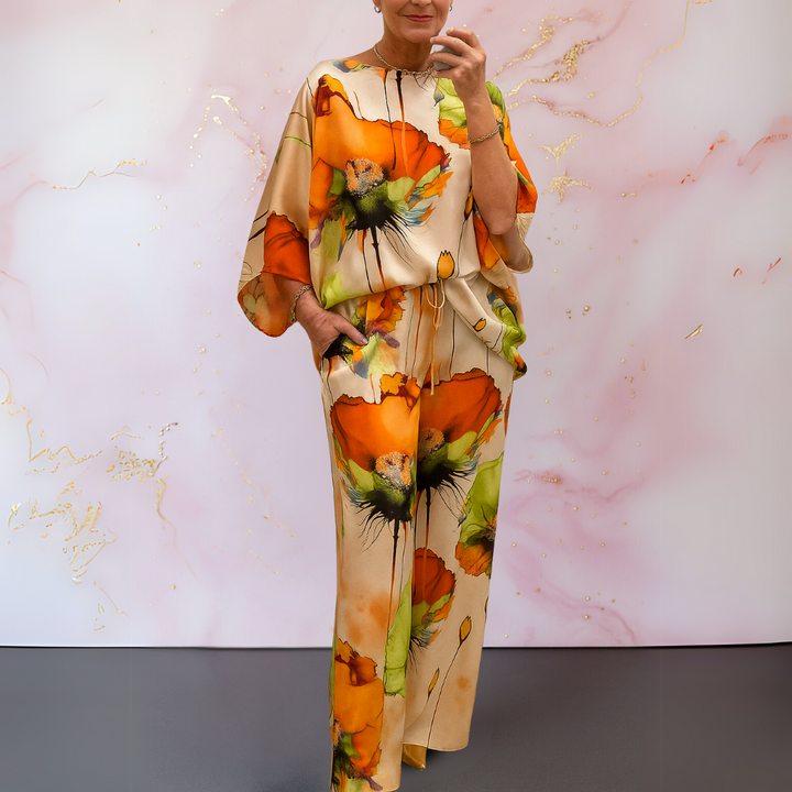 Stylish women's satin two-piece set featuring a sophisticated top and comfortable wide-leg pants.
