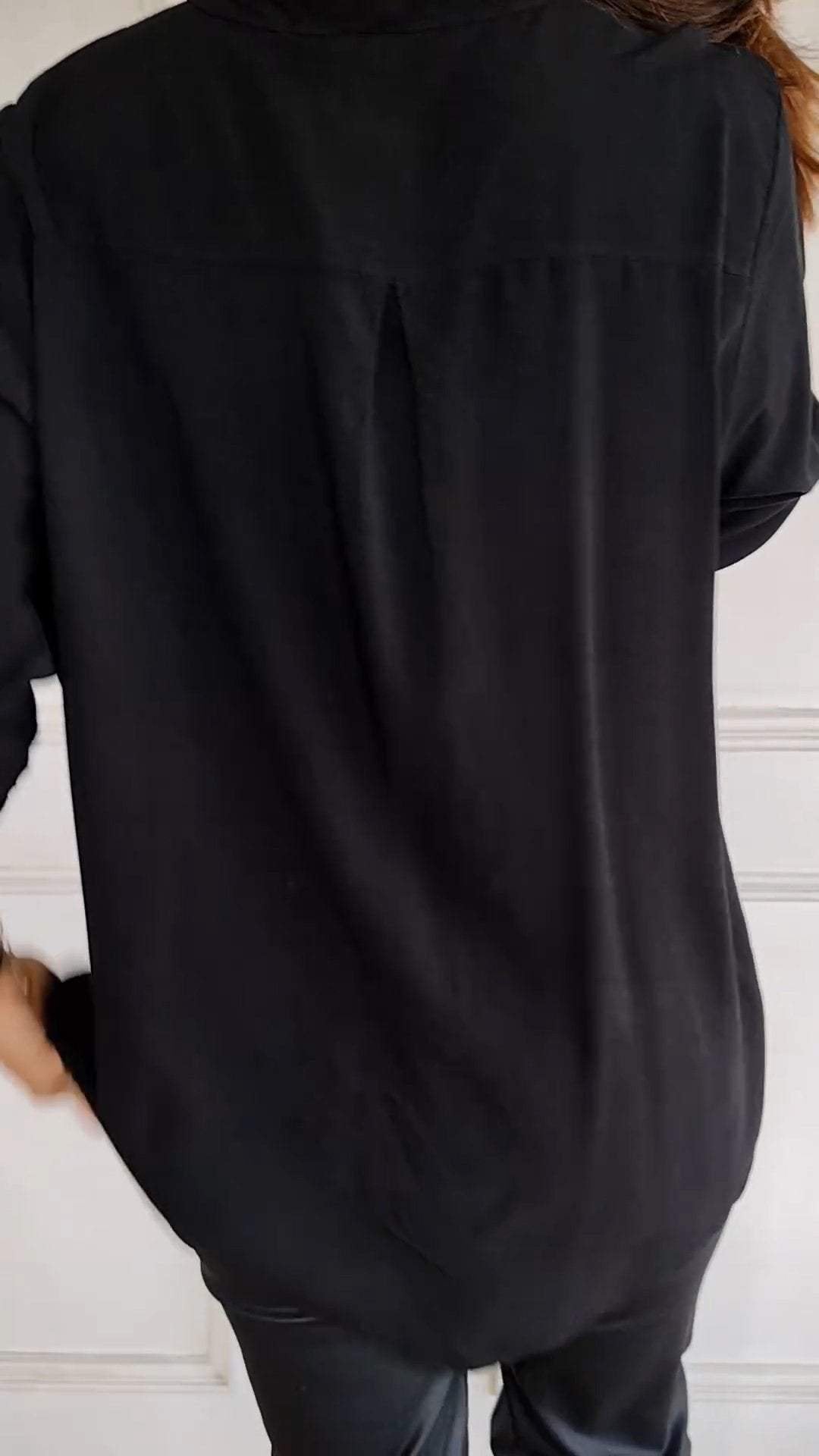 Chic sequin top for women, a sophisticated button-up blouse for elegant wear.