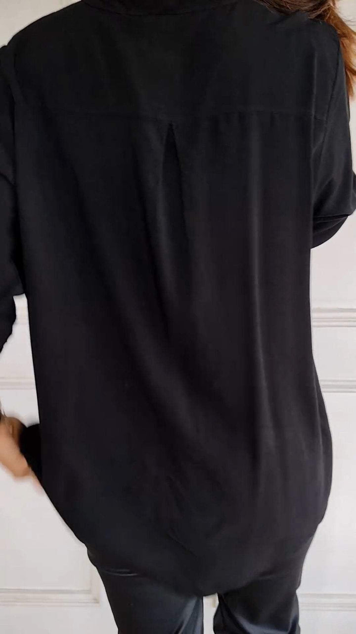 Chic sequin top for women, a sophisticated button-up blouse for elegant wear.