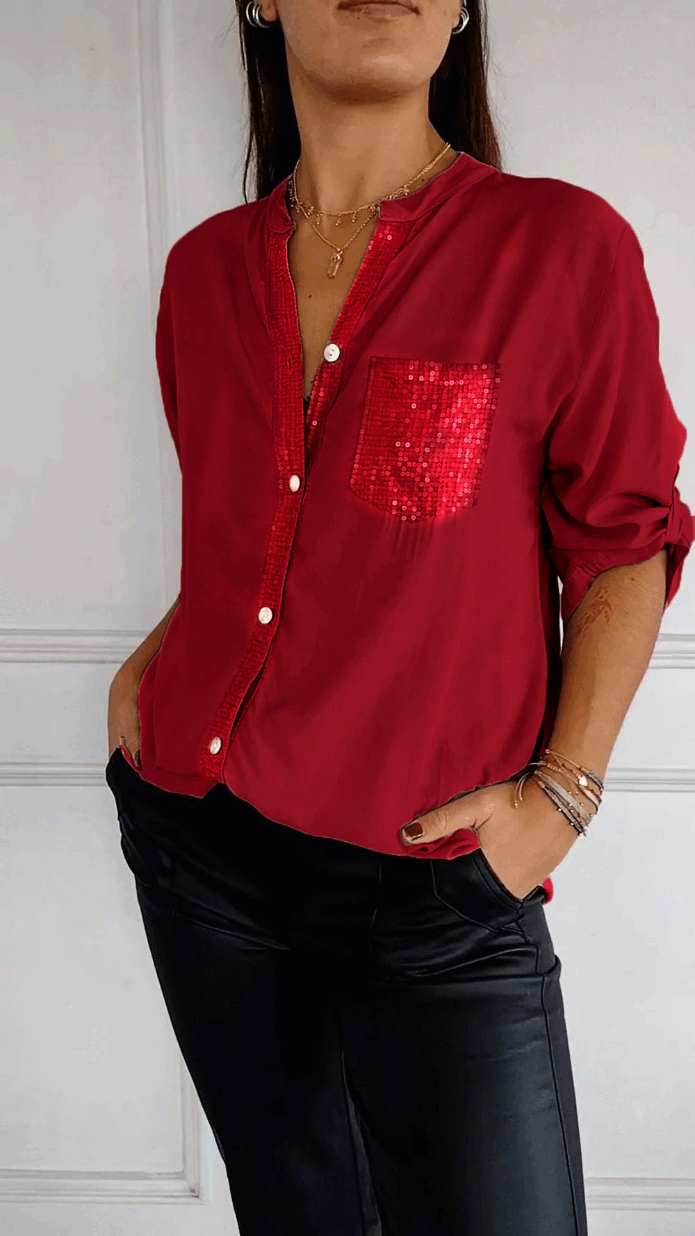 Women's sequin embellished shirt, a versatile and chic button-up top for fashionistas.