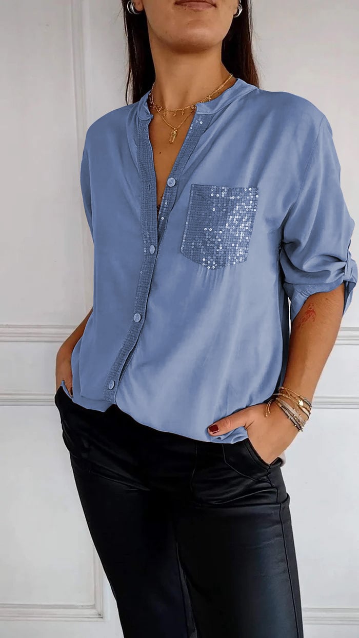 Stylish women's relaxed fit button-up top with sparkling sequin accents, day to night.