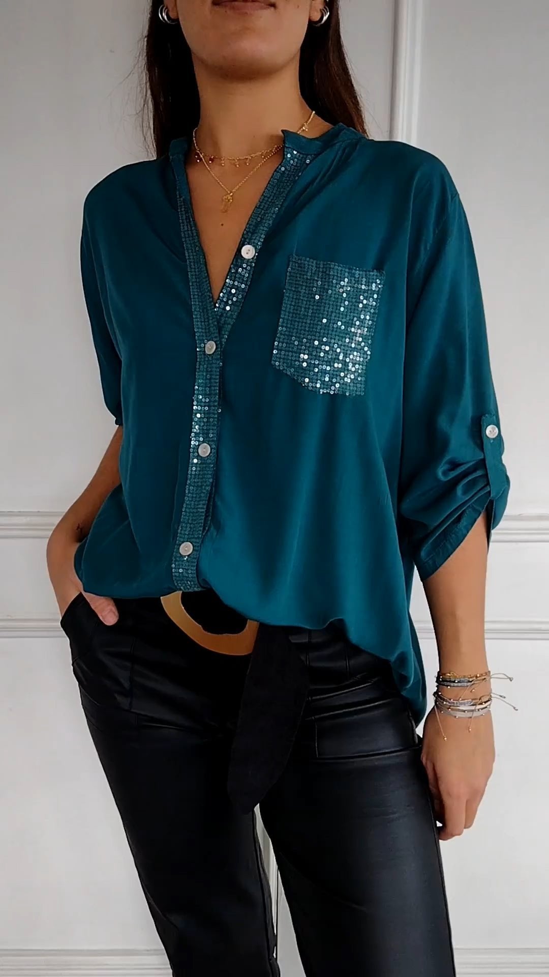 Versatile women's blouse, sequin trim, button-up, perfect for creating chic outfits.