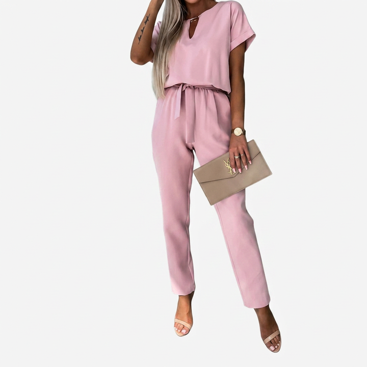 Women's elegant short-sleeve keyhole jumpsuit with tapered leg, perfect for office or dinner. Chic & comfortable.