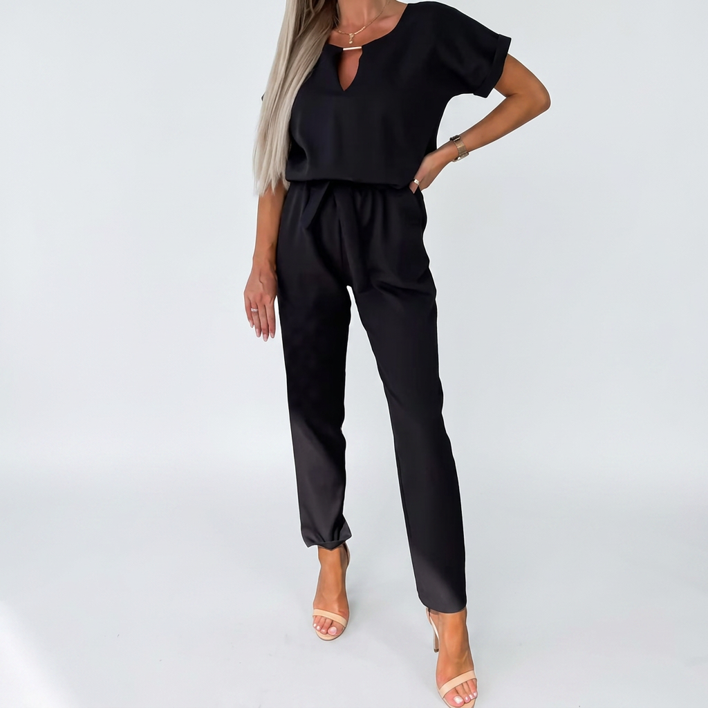 Chic women's short-sleeve keyhole jumpsuit for versatile fashion. Ideal for office wear or a sophisticated dinner outfit.