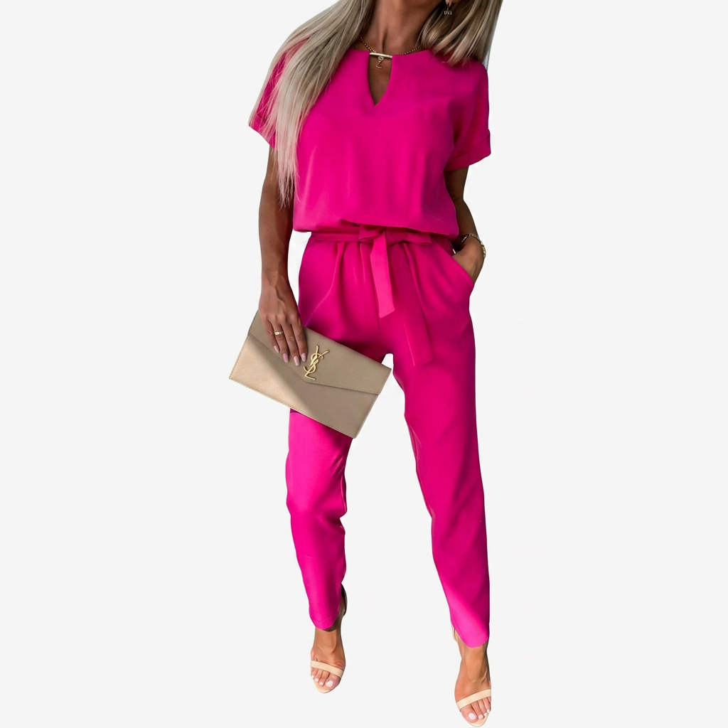 Modern women's short-sleeve keyhole jumpsuit with tapered leg. Offers a comfort fit & sophisticated look for any occasion.