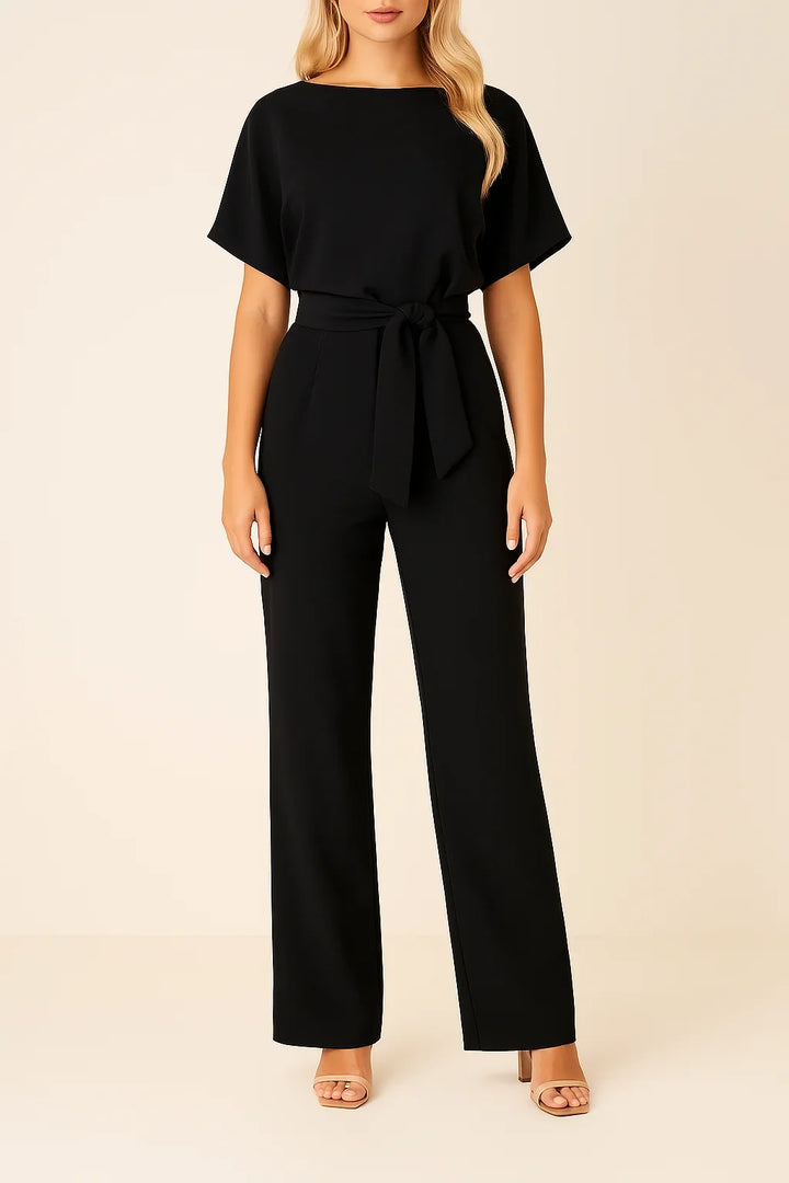 Women's elegant short sleeve wide leg jumpsuit with tie waist. Perfect for versatile styling.